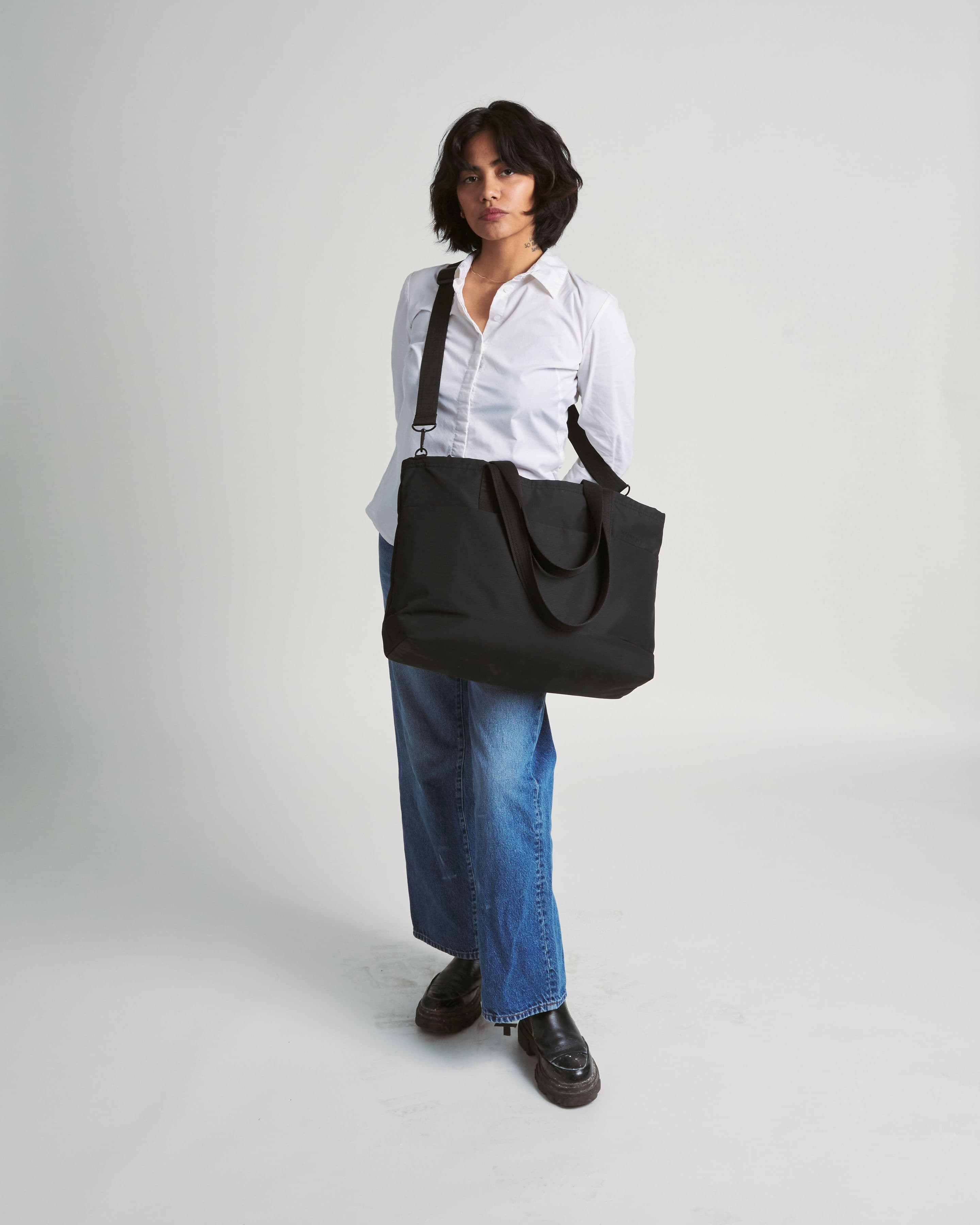 Use cross-body strap or shoulder straps.