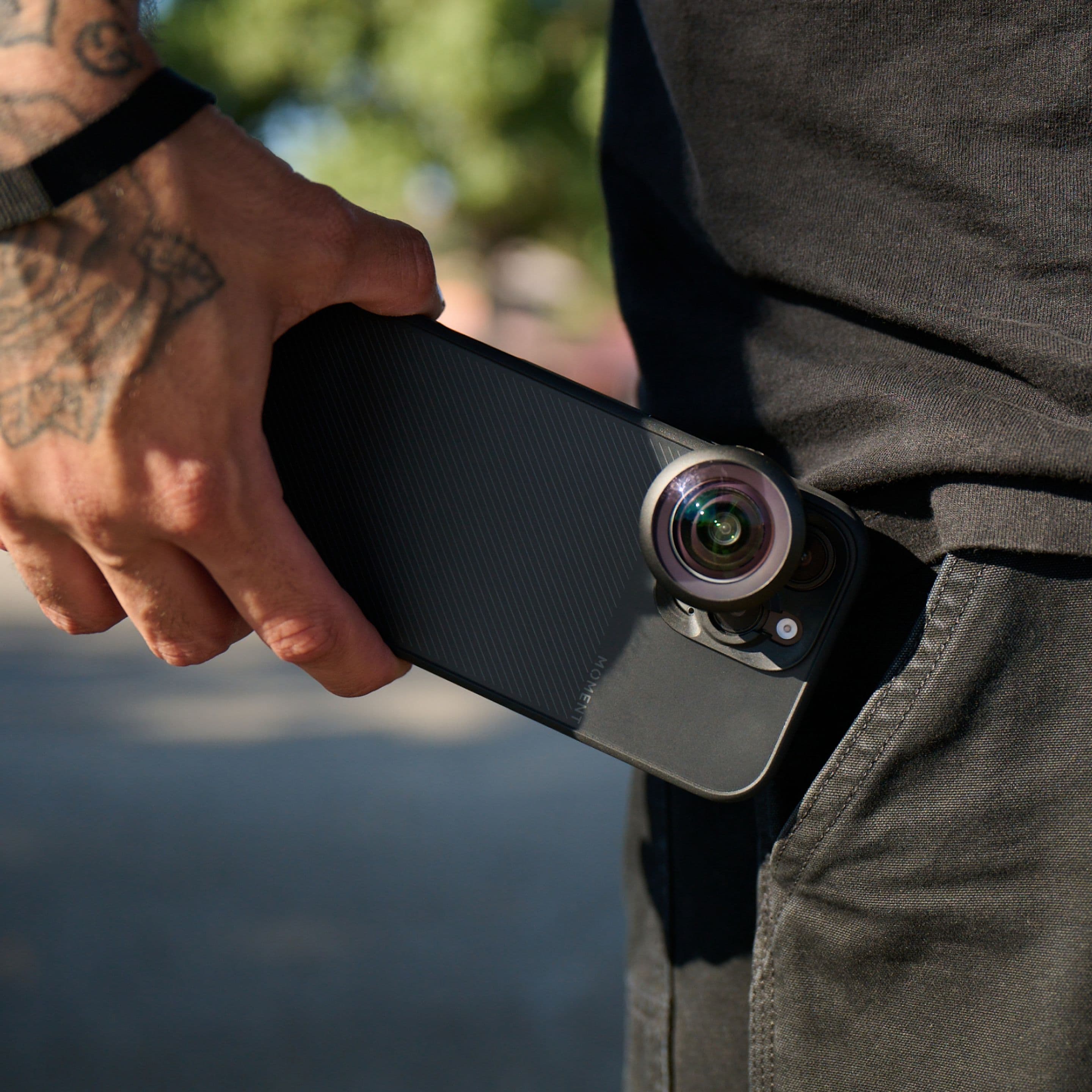 iPhone 16 with attachable mobile lenses.